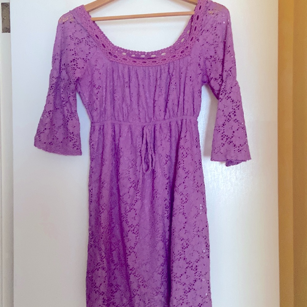 Lace dress with 3/4 bell sleeves and cinched waist. Size Small.